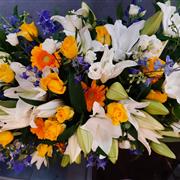 Blue, Yellow, &amp; White Casket spray